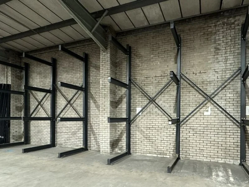 JPS Chartered Surveyors - Warehouse Auction | Heavy Duty Cantilever Racking, Chipboard, Racking Crossbeams & More - Auction Image 1